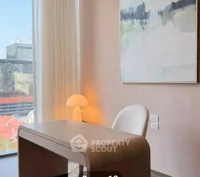 Modern study room with elegant desk and city view