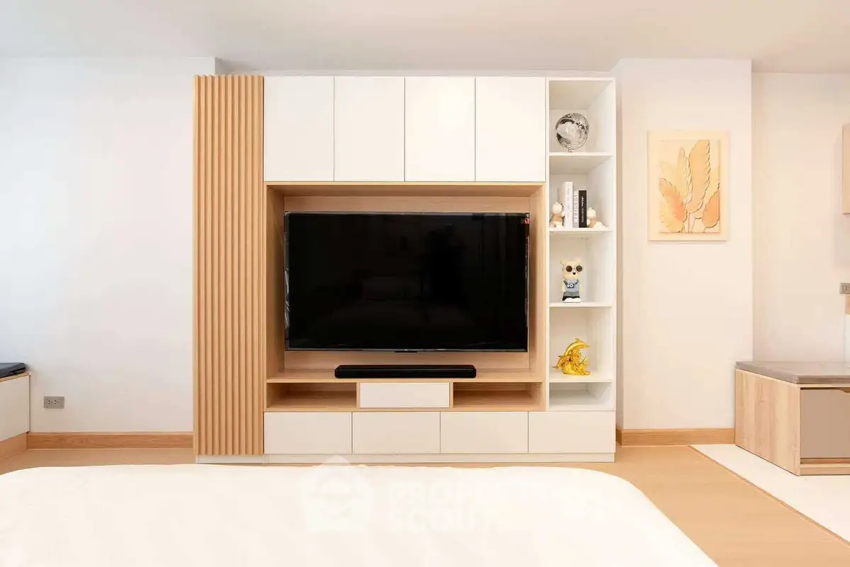 Modern living room with sleek TV unit and stylish decor