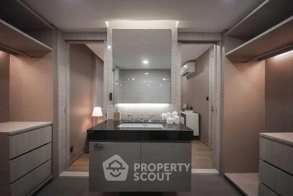 Luxurious modern bathroom with sleek design and ambient lighting