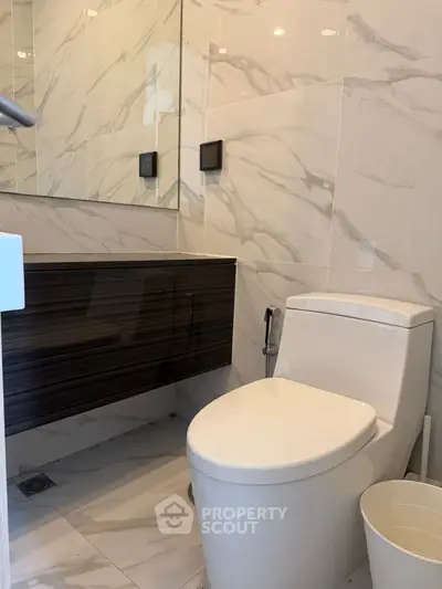 Modern bathroom with sleek design and marble tiles