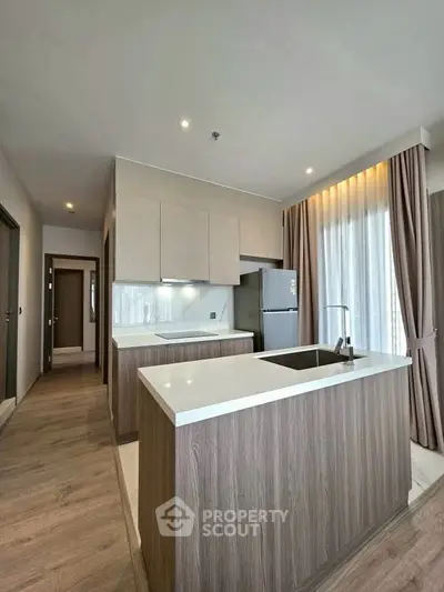 Modern kitchen with sleek design and open layout in a stylish apartment