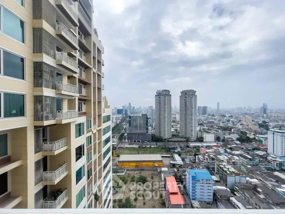 Stunning cityscape view from high-rise apartment balcony