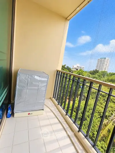 Spacious balcony with scenic view in modern apartment