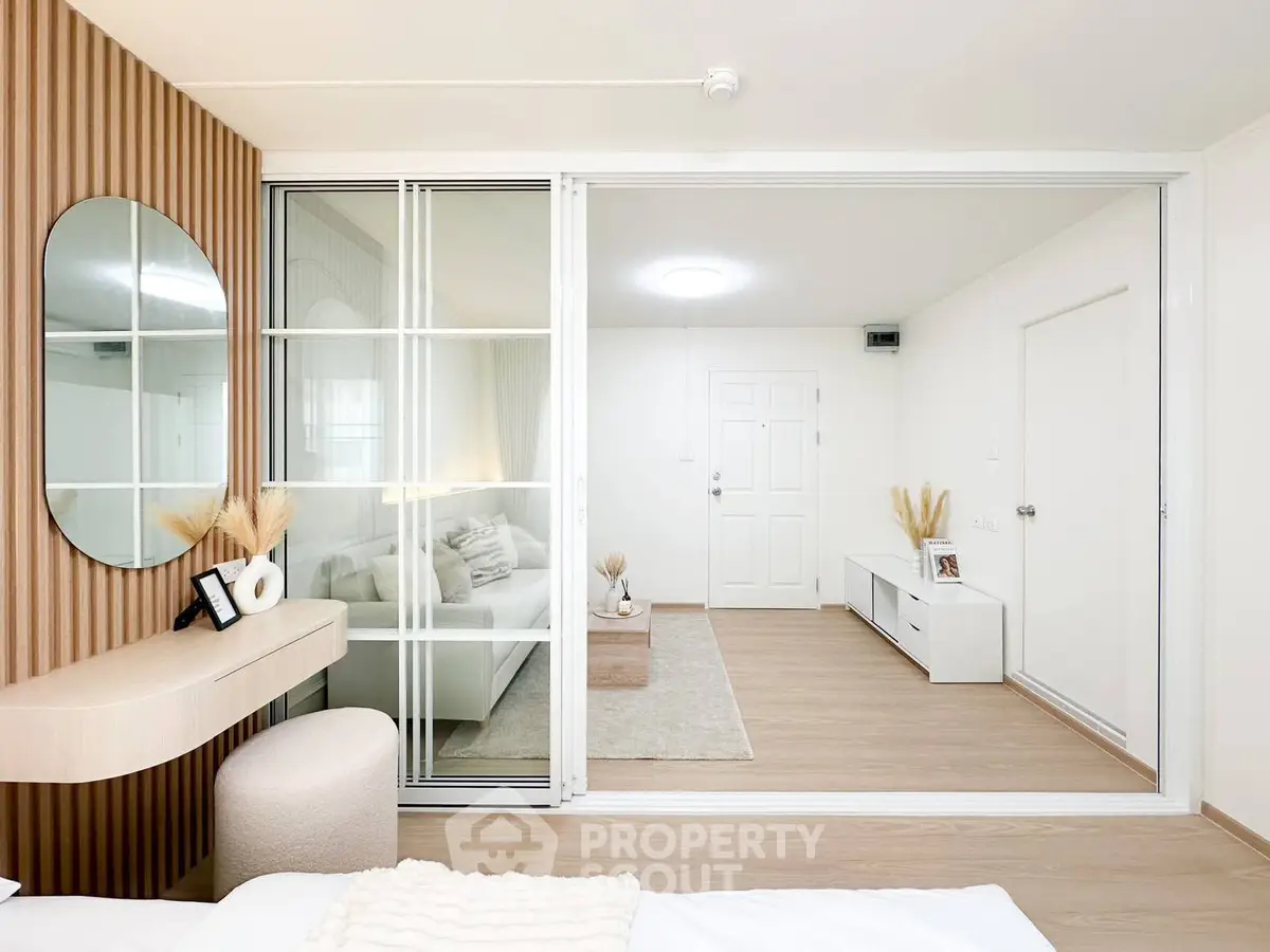Modern living room with stylish decor and sliding glass doors