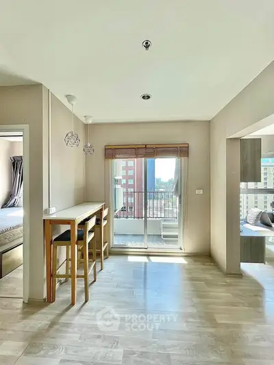 Bright modern apartment with open layout and balcony view