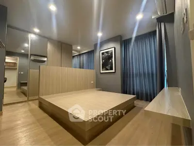 Modern minimalist bedroom with wooden platform bed and stylish decor