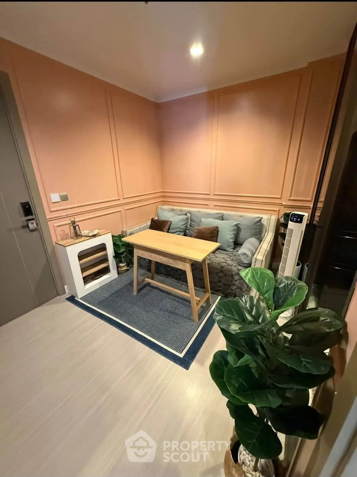 Cozy living room with stylish decor and comfortable seating in modern apartment.