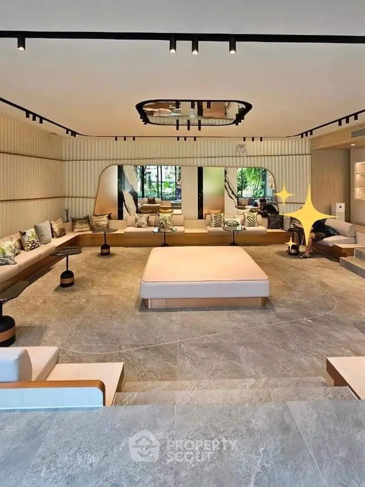 Luxurious modern living room with elegant seating and stylish decor, perfect for relaxation and entertainment.