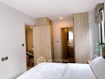 Modern bedroom with ensuite bathroom and stylish decor