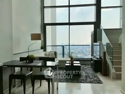 Modern living room with stunning city view and stylish decor
