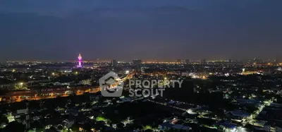 Stunning cityscape view with illuminated skyline at night, perfect for urban living enthusiasts.