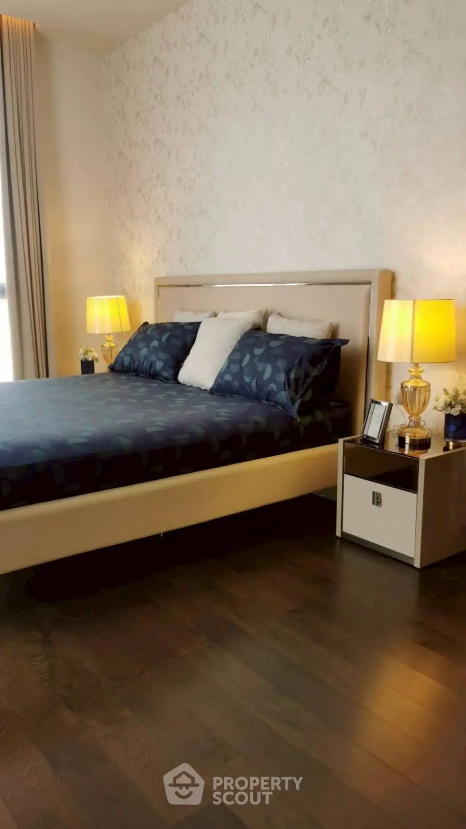 Elegant bedroom with stylish decor and cozy lighting