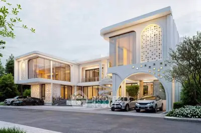 Stunning modern luxury home with sleek architecture and spacious driveway.