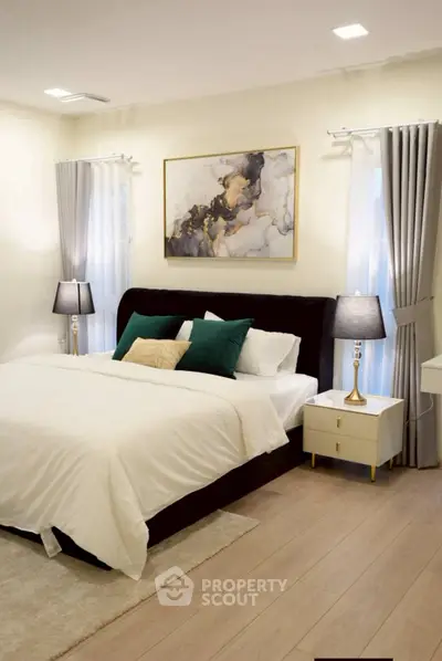 Elegant bedroom with modern decor and cozy lighting