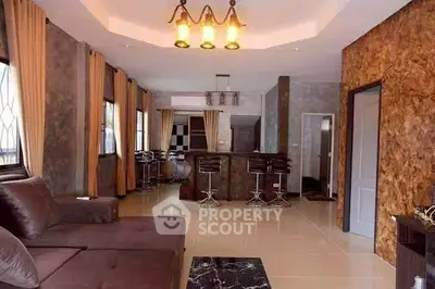 Luxurious living room with modern decor and stylish bar area