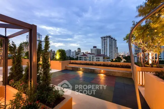 Stunning rooftop terrace with city skyline views, perfect for relaxation and entertainment.