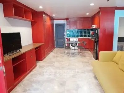 Vibrant red kitchen with open layout and modern appliances