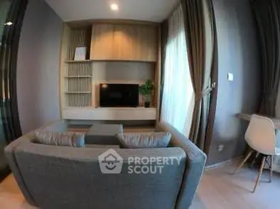 Modern living room with stylish furniture and natural light