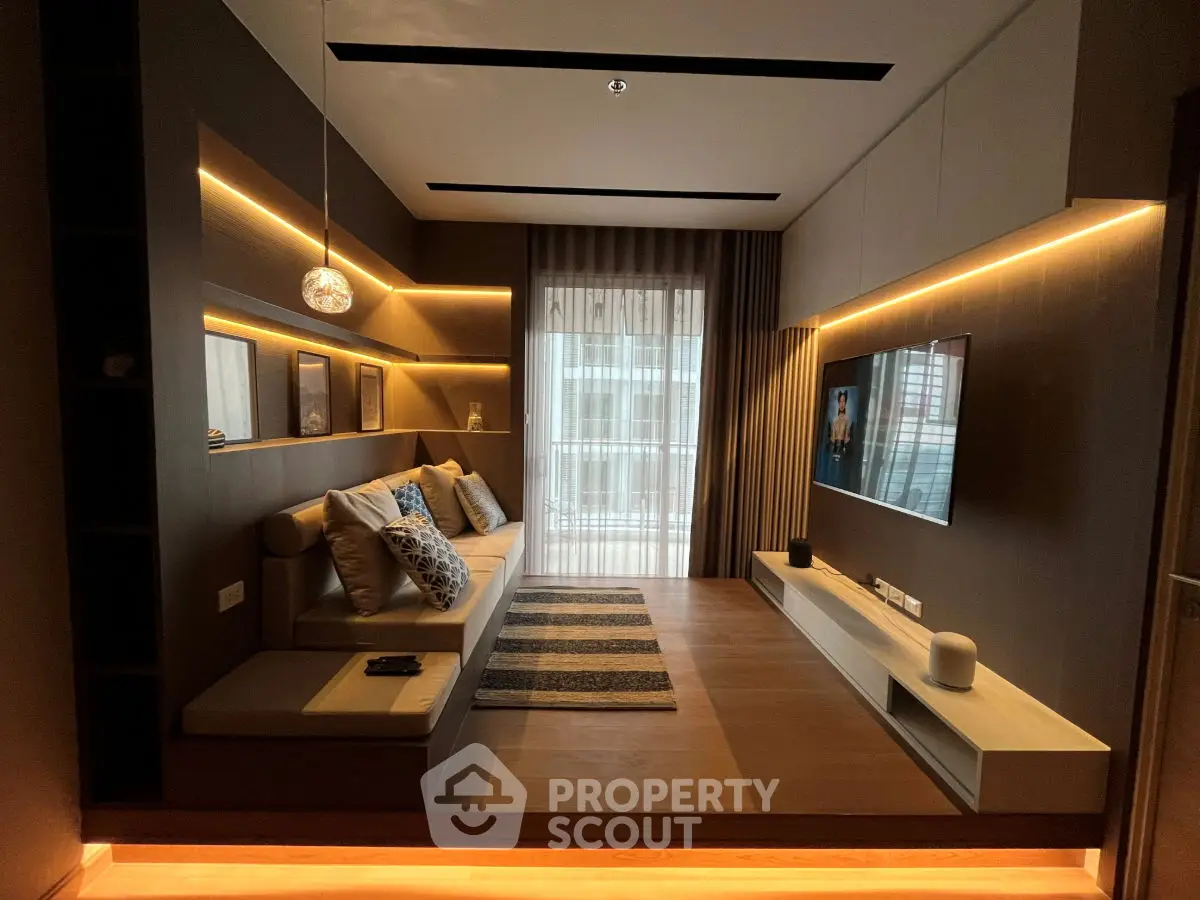 Modern living room with stylish lighting and cozy seating area