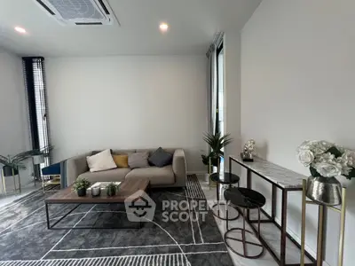 Modern living room with stylish decor and cozy seating area