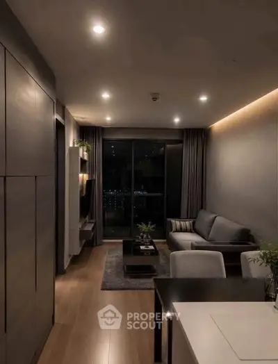 Modern living room with sleek design and city view, featuring cozy seating and ambient lighting.
