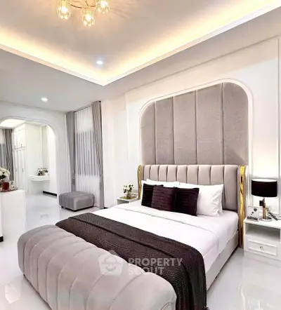 Luxurious bedroom with elegant decor and ambient lighting