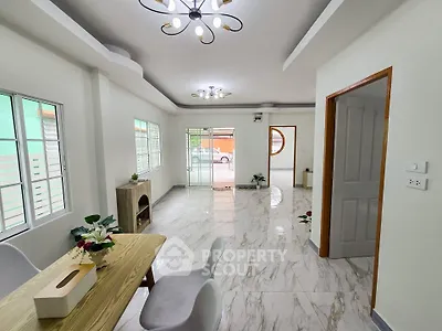Spacious modern living room with elegant dining area and marble flooring