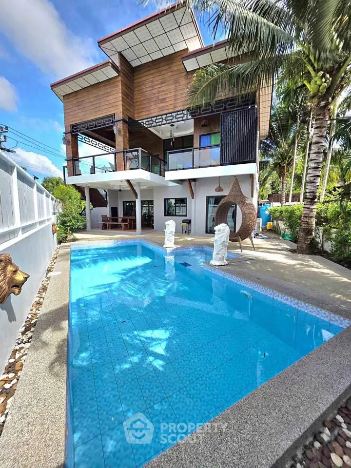 Stunning modern villa with private pool and tropical garden view