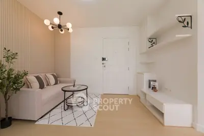 Modern living room with stylish decor and elegant lighting