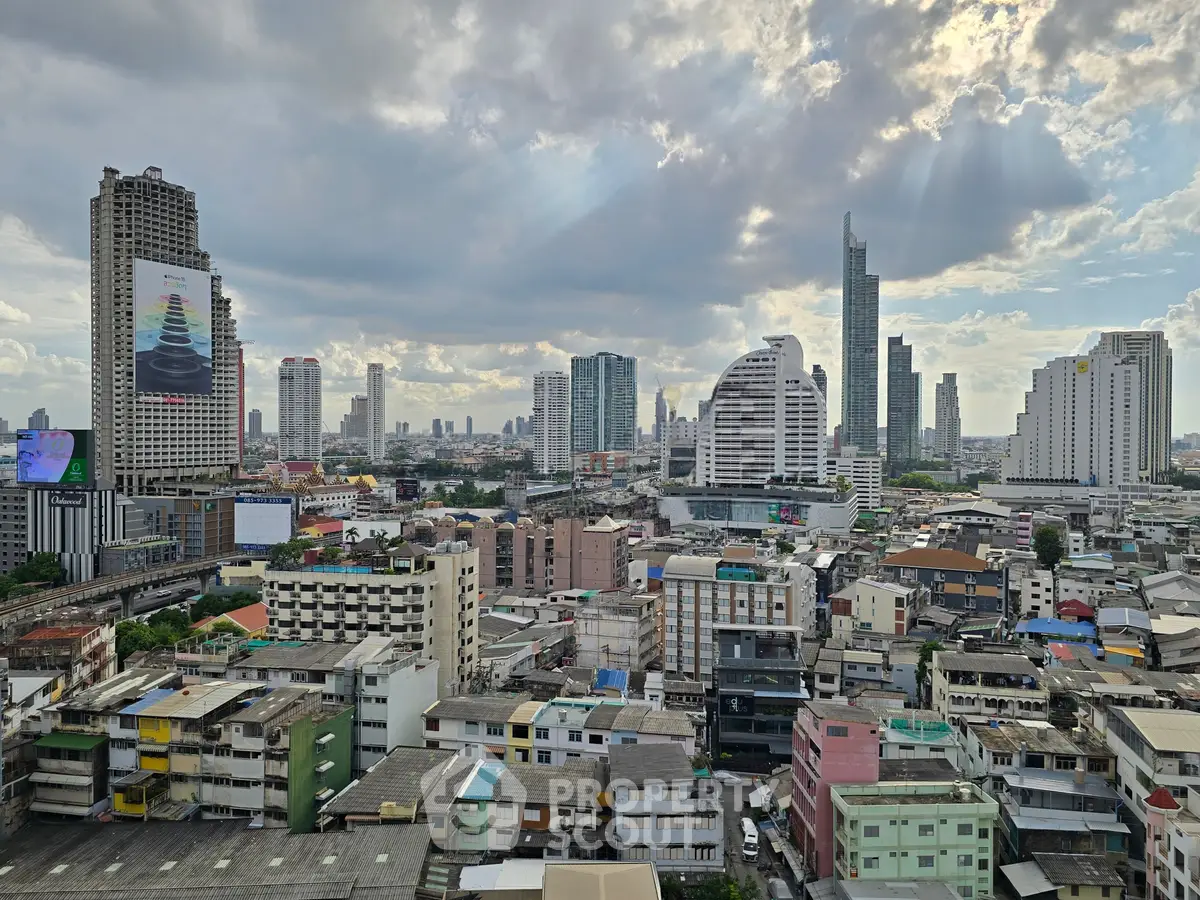 Stunning cityscape view showcasing modern skyscrapers and urban architecture under a dramatic sky.