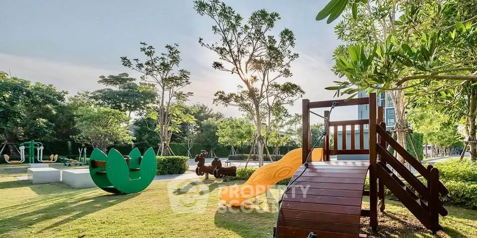 Charming residential playground with lush greenery and modern play equipment, perfect for family-friendly living.