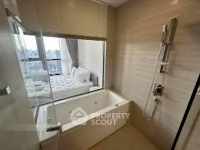 Luxurious bathroom with bathtub and city view from window, modern design.