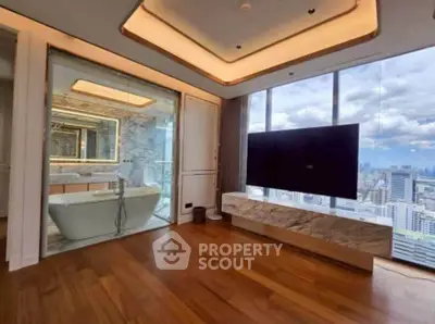 Luxurious high-rise apartment with stunning city view and modern interior design.