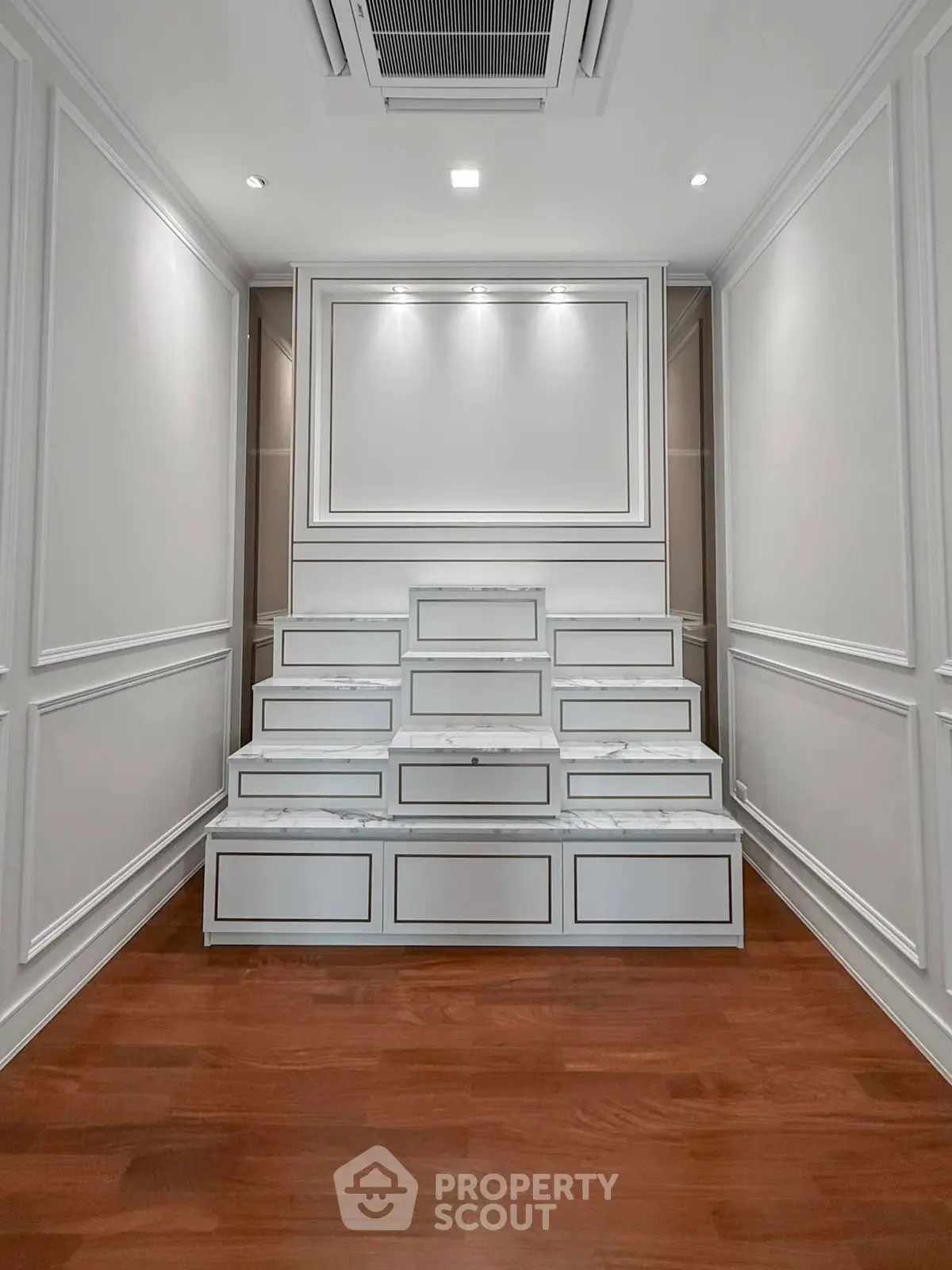 Elegant interior with wooden flooring and decorative wall panels