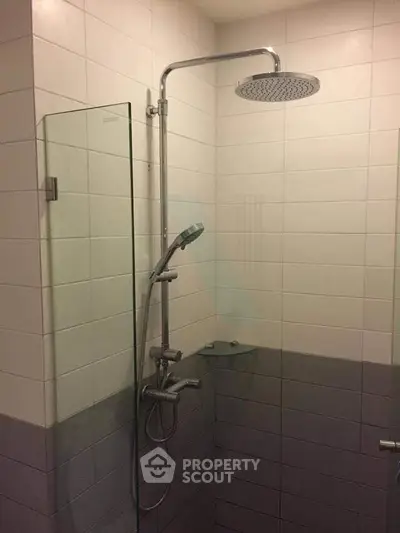 Modern bathroom with sleek shower design and glass partition