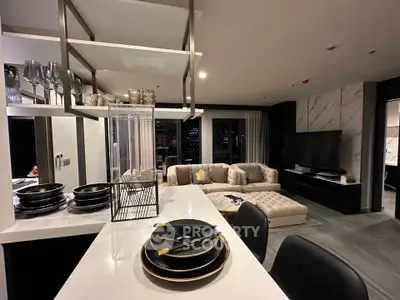 Luxurious modern living room with open kitchen and elegant decor