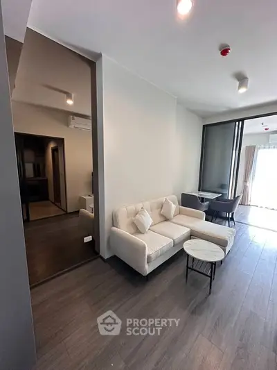 Modern living room with stylish furniture and open layout, perfect for urban living.