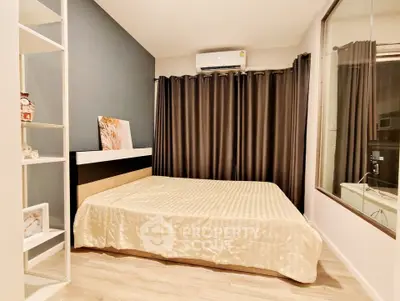 Cozy bedroom with modern decor and large window, featuring a comfortable bed and stylish curtains.