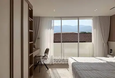 Bright bedroom with mountain view and elegant decor