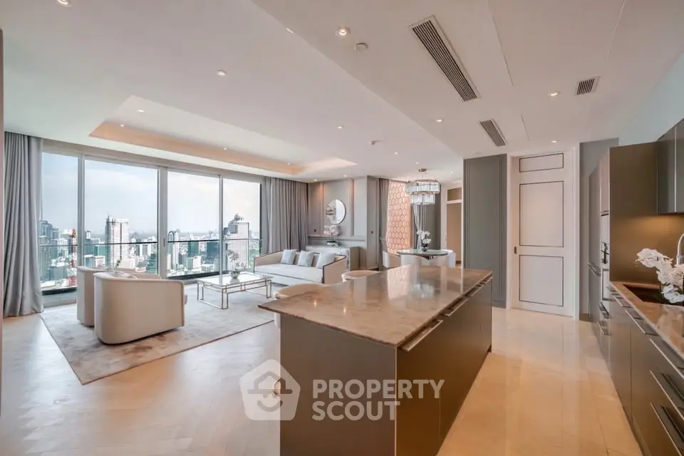 Luxurious open-plan living room with stunning city views and modern kitchen design.