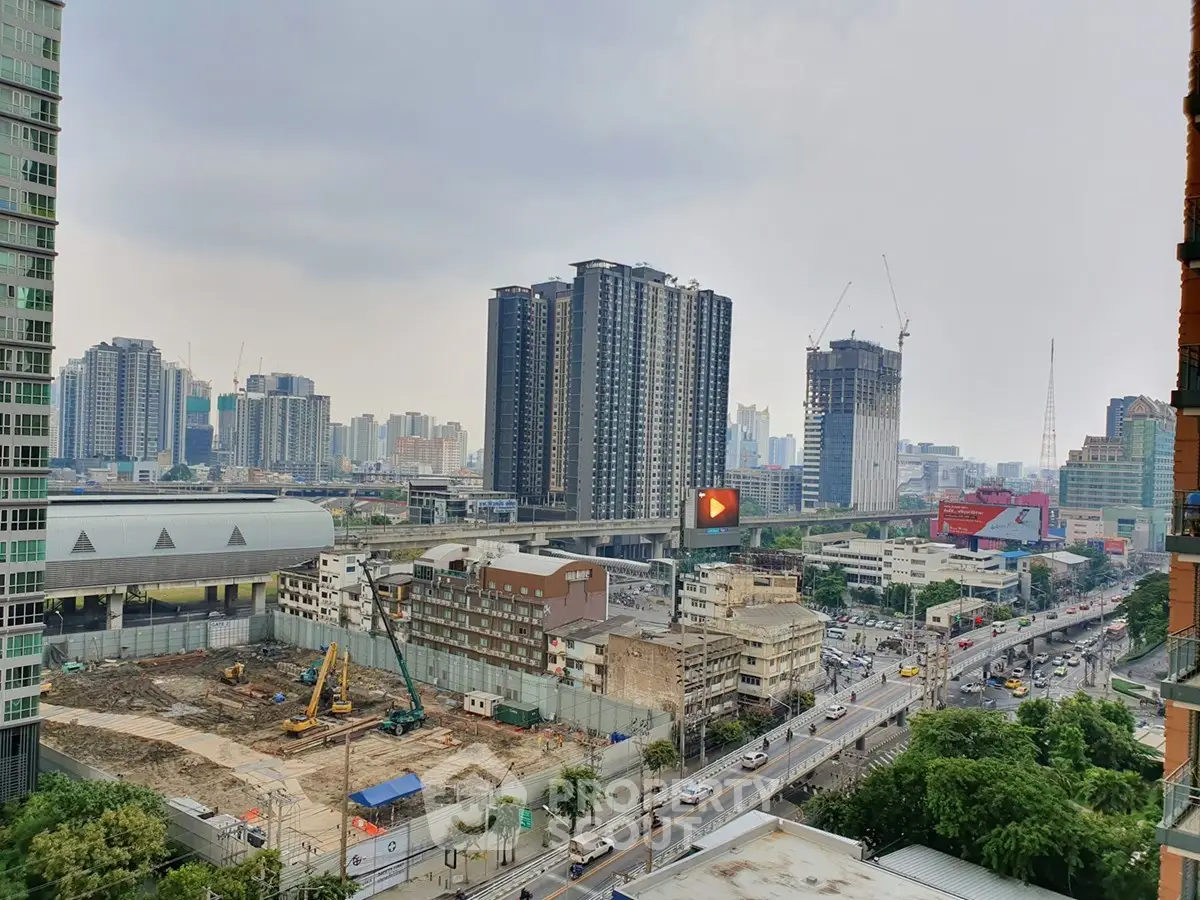 Stunning cityscape view showcasing urban development and high-rise buildings under construction.