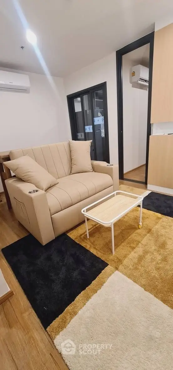 Modern living room with cozy sofa and stylish decor