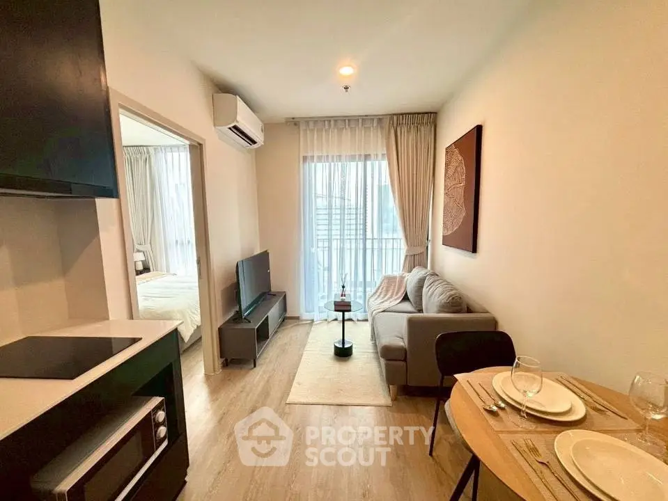 Modern living room with cozy sofa and dining area in stylish apartment