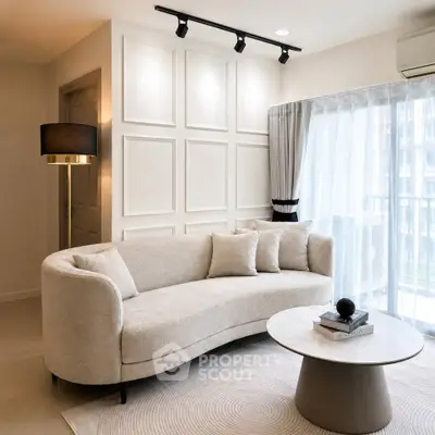 Elegant living room with modern beige sofa and stylish decor