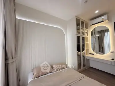 Modern bedroom with elegant lighting and built-in wardrobe