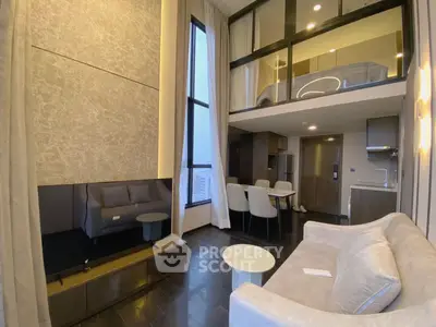 Luxurious modern living room with high ceilings and mezzanine level