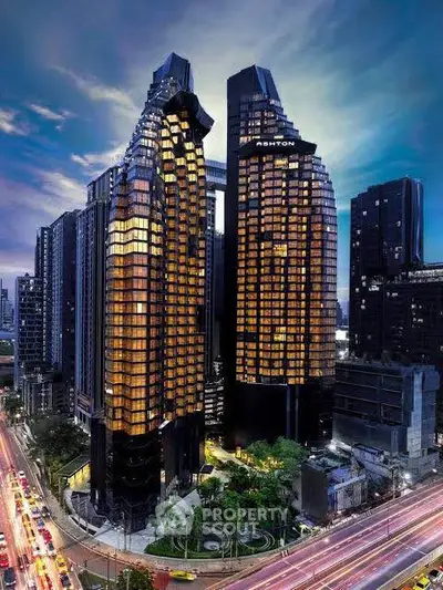 Stunning modern skyscrapers with unique architecture and vibrant cityscape view at dusk.