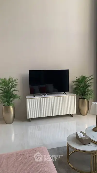 Modern living room with sleek TV stand and elegant decor