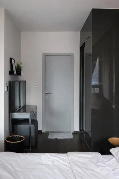 Modern bedroom with sleek furniture and minimalist decor