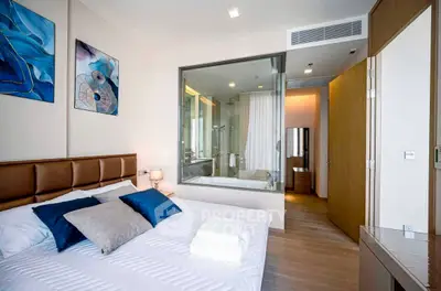 Modern bedroom with ensuite bathroom and stylish decor